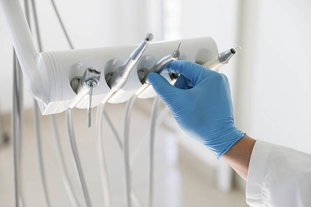 Professional Tooth Extraction technician working in Alamo, TX